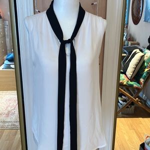 White Sleeveless Blouse with Black Tie-front